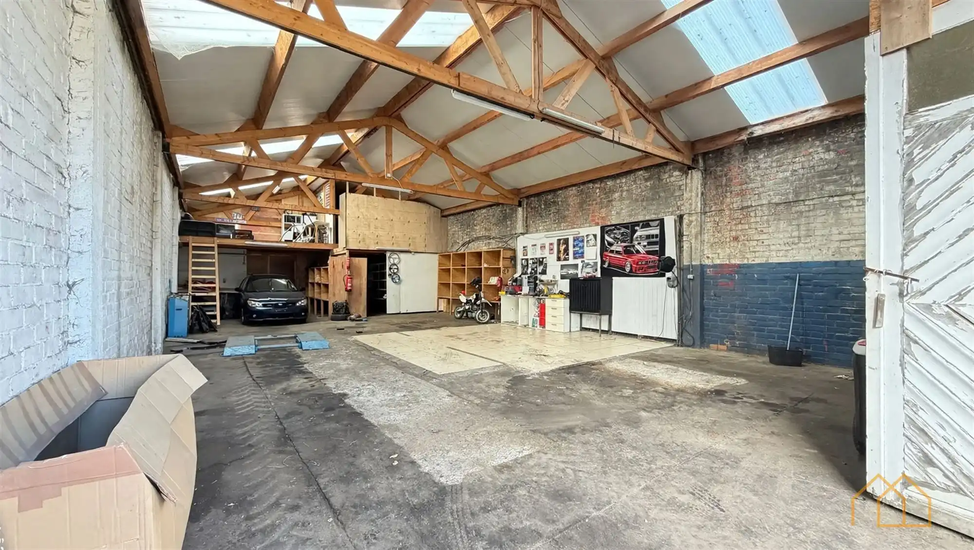 Hal van 200m² met tuin  foto 9