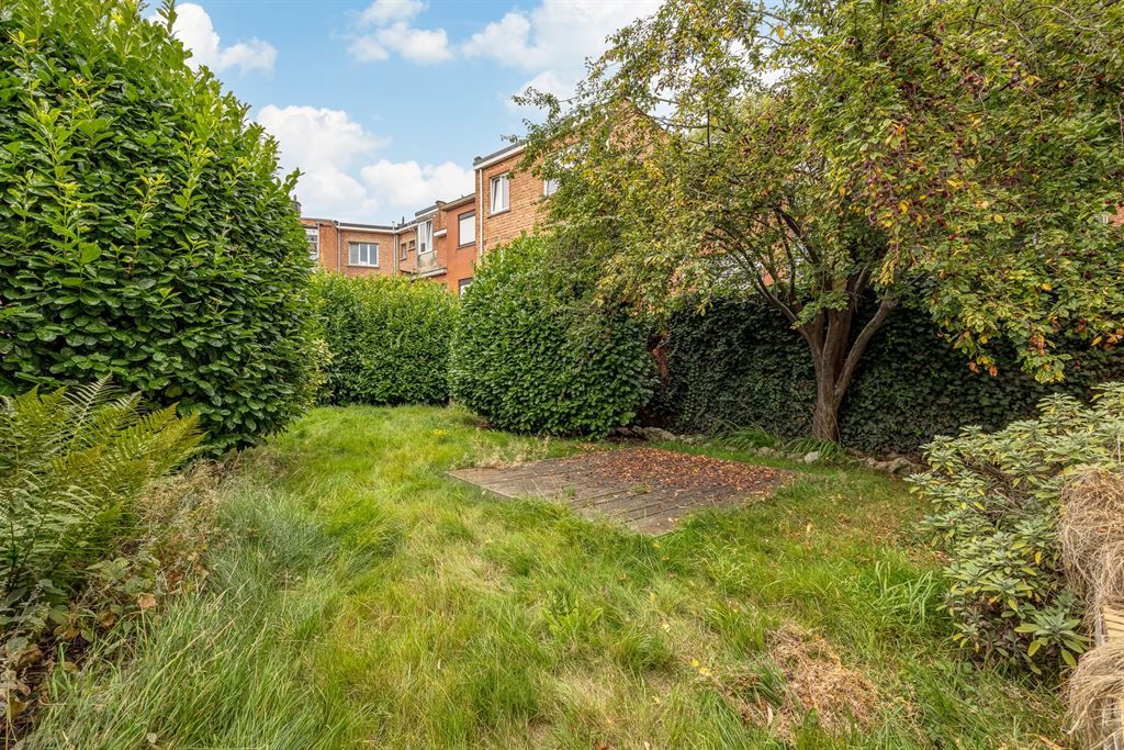 Gelijkvloers appartement met groene tuin foto 5