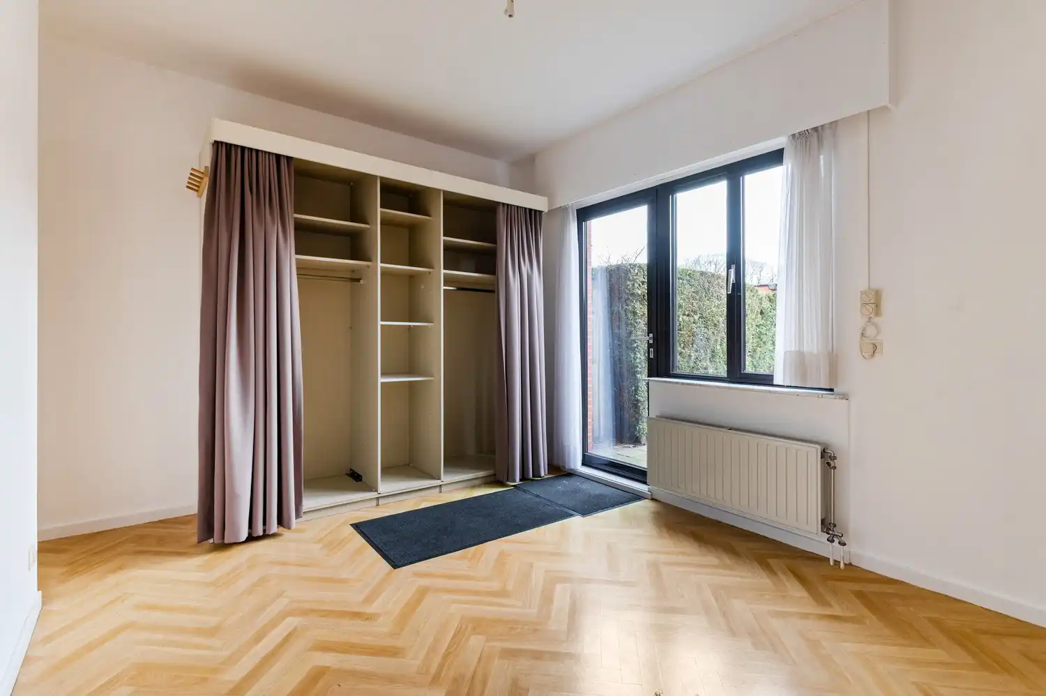 Gelijkvloers appartement met 2 slaapkamers en tuintje in Wijnegem! foto 9