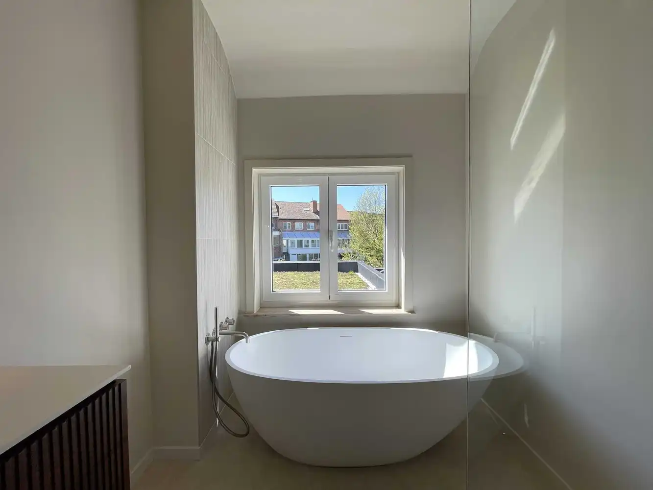 Smaakvol gerenoveerde woning met stadstuin foto 21