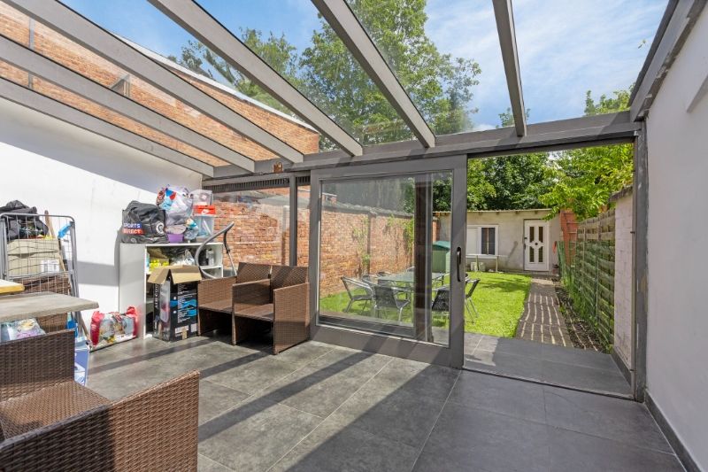 Instapklare rijwoning Mechelen met 4 slaapkamers, tuin met achteruitgang en oprit! foto 7