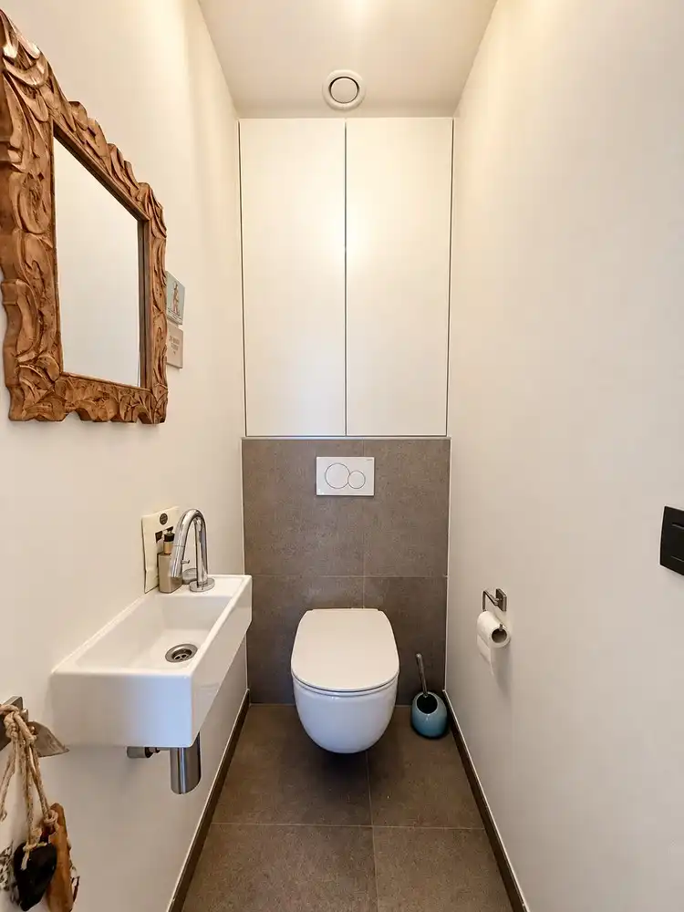 Modern gelijkvloers appartement met drie slaapkamers en gezellig tuintje foto 17