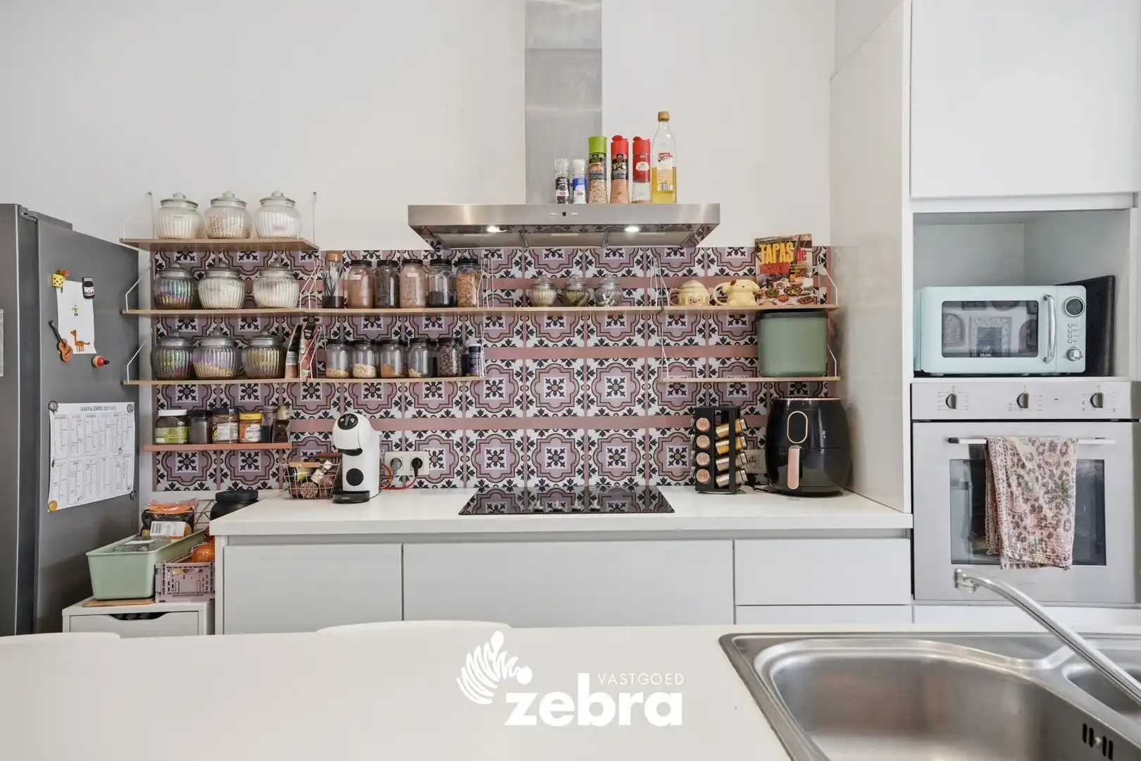 Instapklare, volledig gerenoveerde woning in Tielt met tuin, terras en uitweg! foto 10