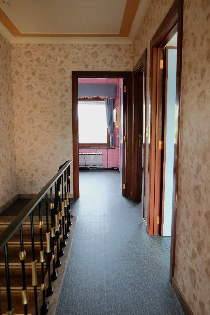 Ruime woning met garage, bijgebouwen en tuin en veel potentieel voor extra slaapkamers foto 15