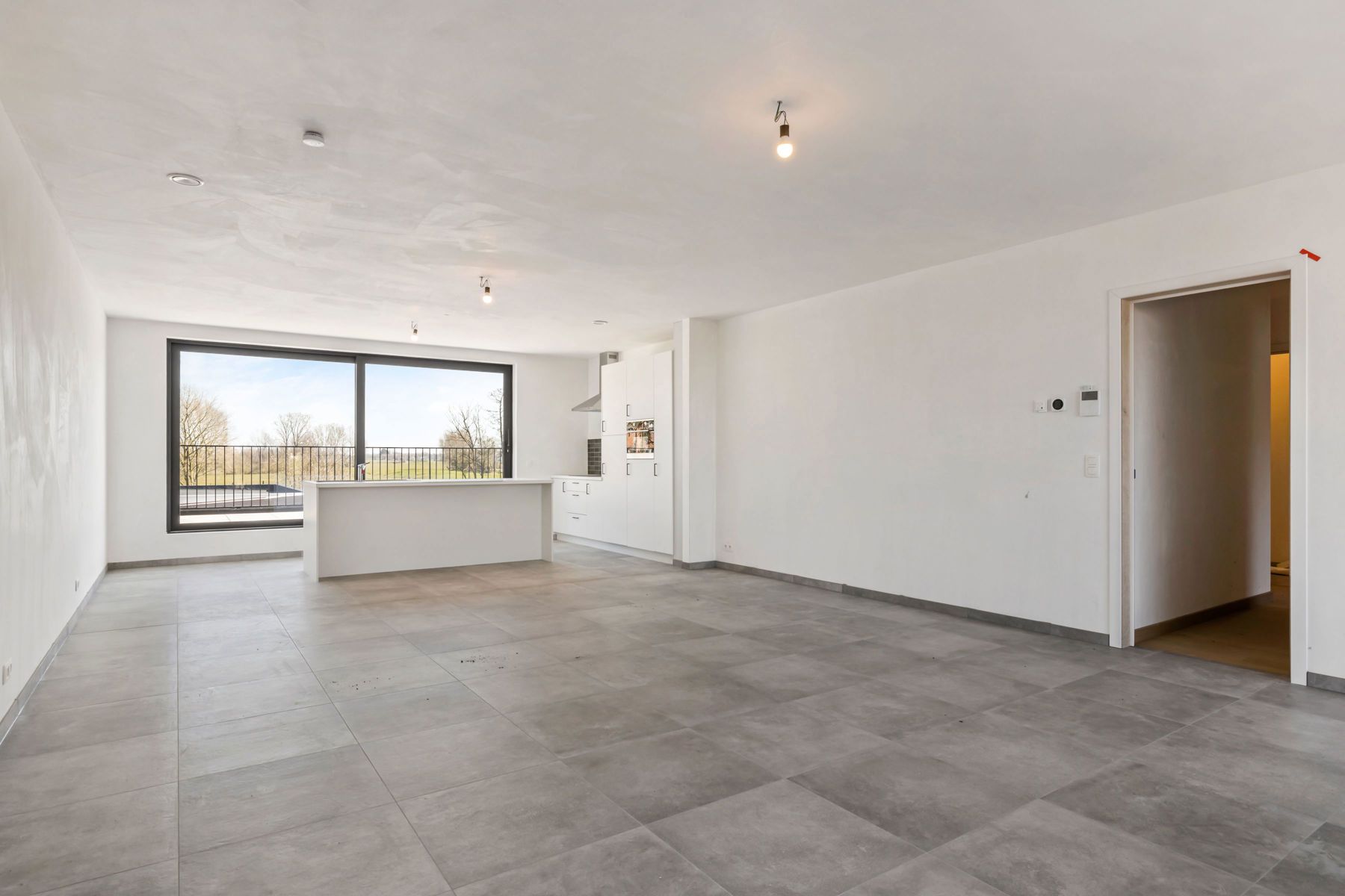 Nieuwbouwappartement met zéér ruim terras en groen zicht foto 7