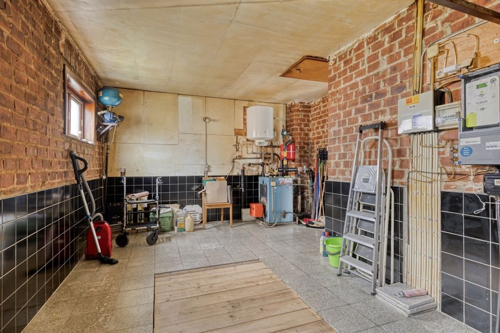 Op te frissen woning te Wilsele!  foto 17