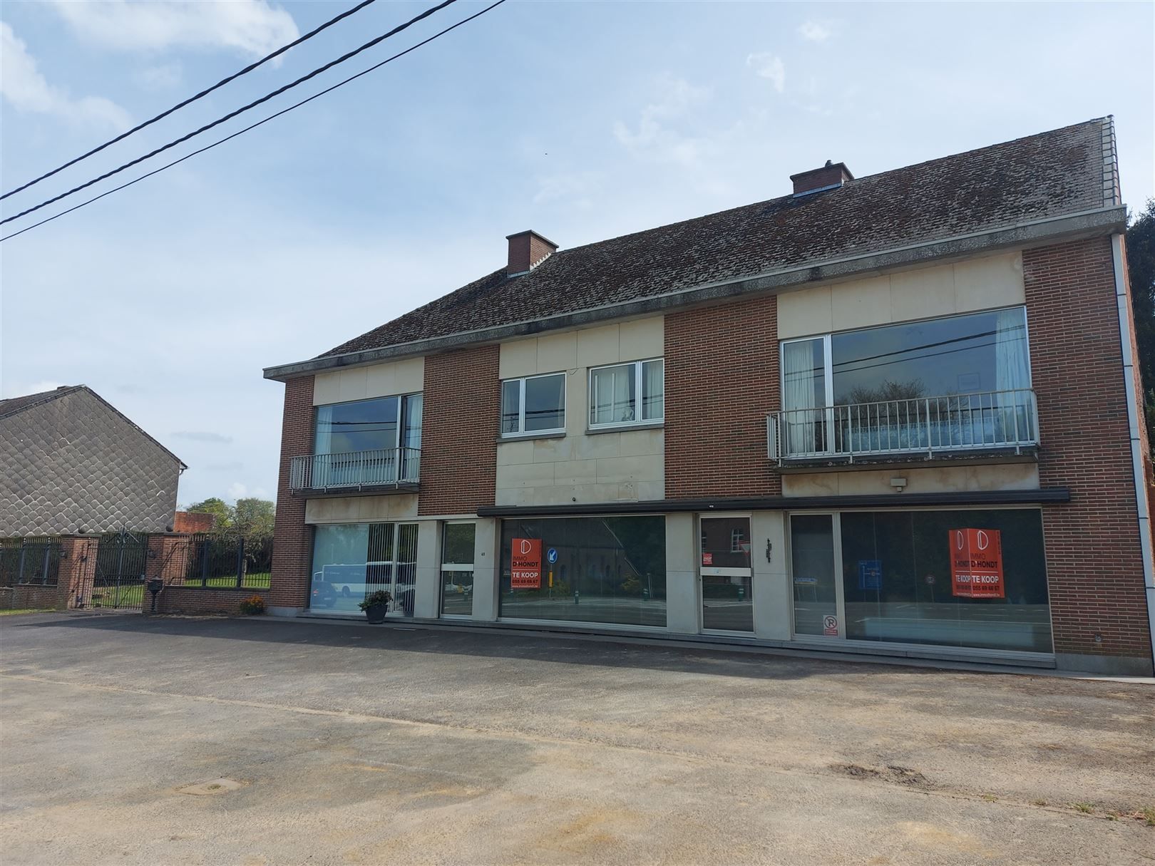 Hoofdfoto van de publicatie: Veelzijdig renovatiepand met woonst en winkel Vloesberg