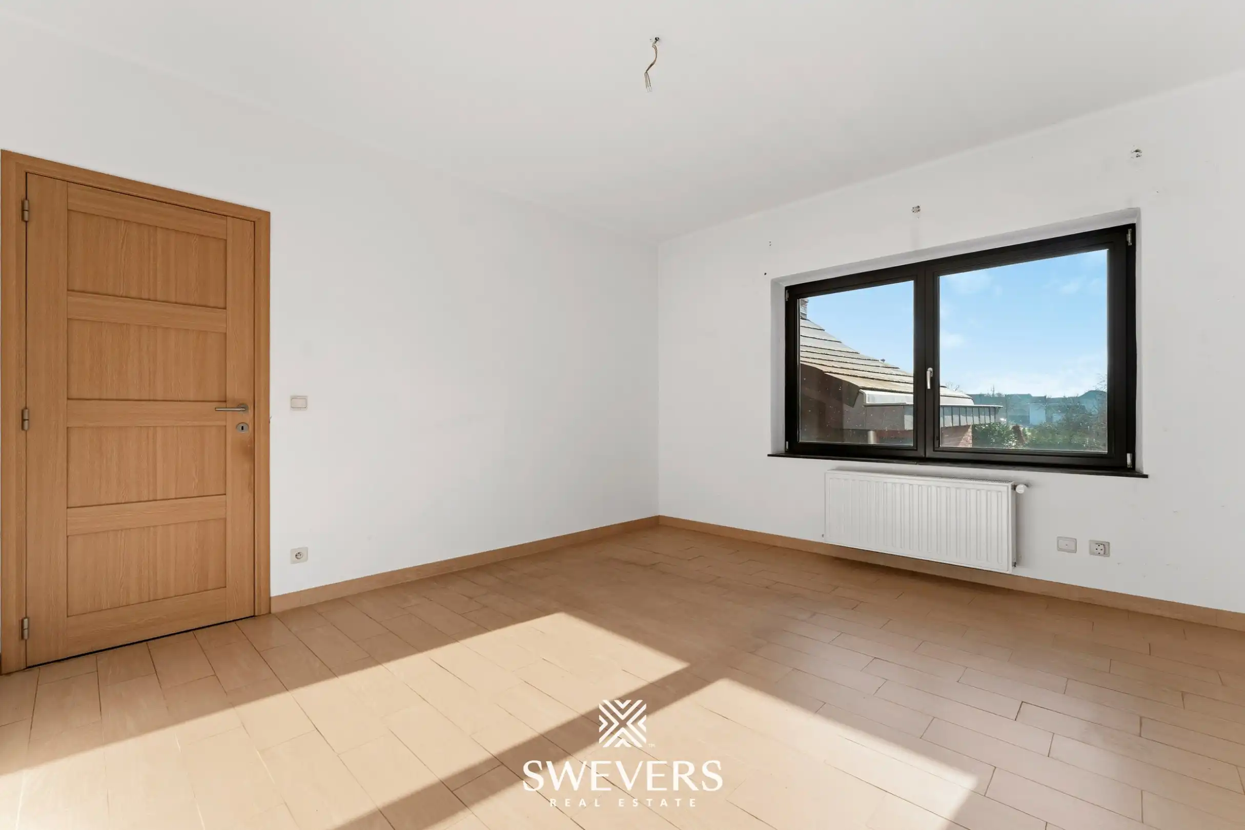 Verrassend ruime gezinswoning: 4 slaapkamers, garage, kelder & zolder foto 13