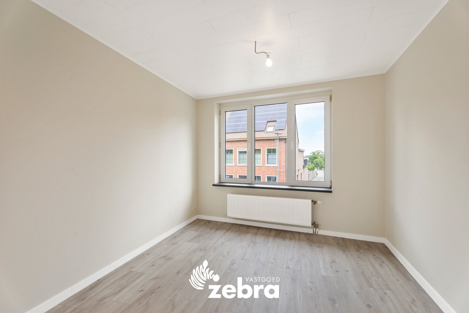 Gerenoveerd duplexappartement in het hartje van Tielt! foto 5