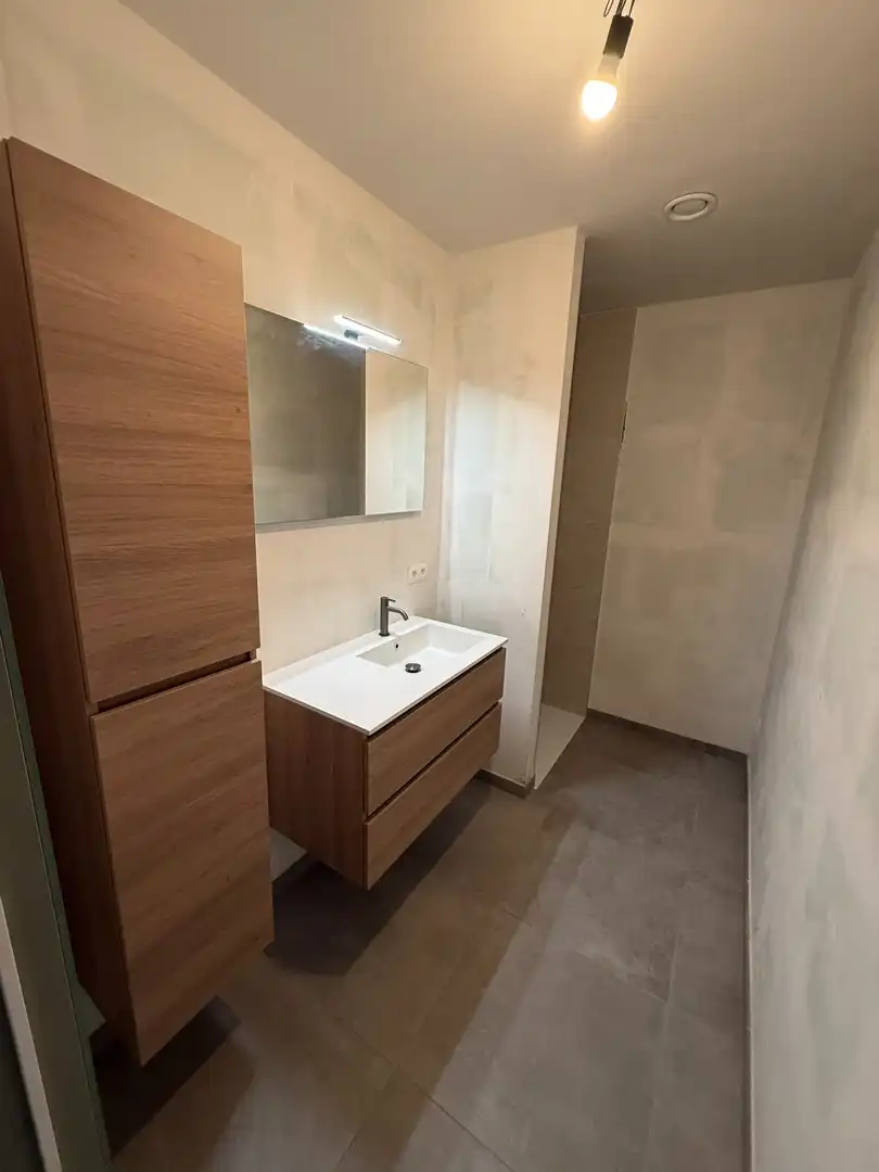 Instapklaar en energiezuinig gelijkvloers appartement met 1 slaapkamer en ruim terras te Riemst. foto 7