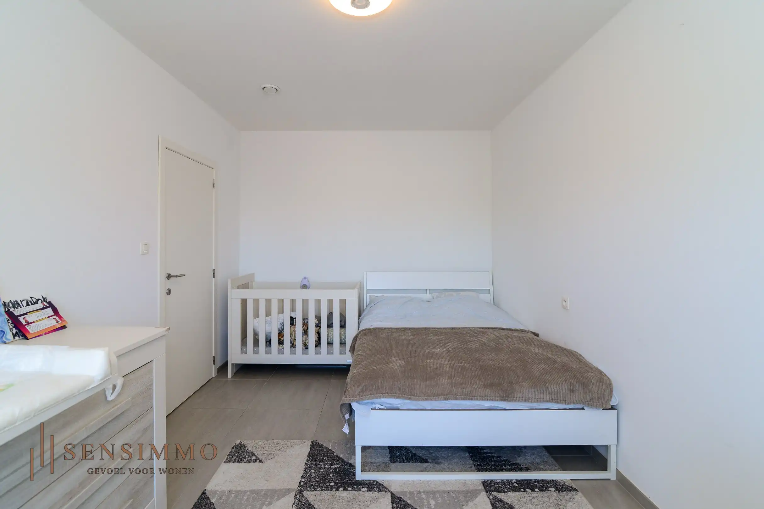 Instapklaar & energiezuinig 1-slaapkamerappartement met 2 terrassen en parking in Maasmechelen foto 9