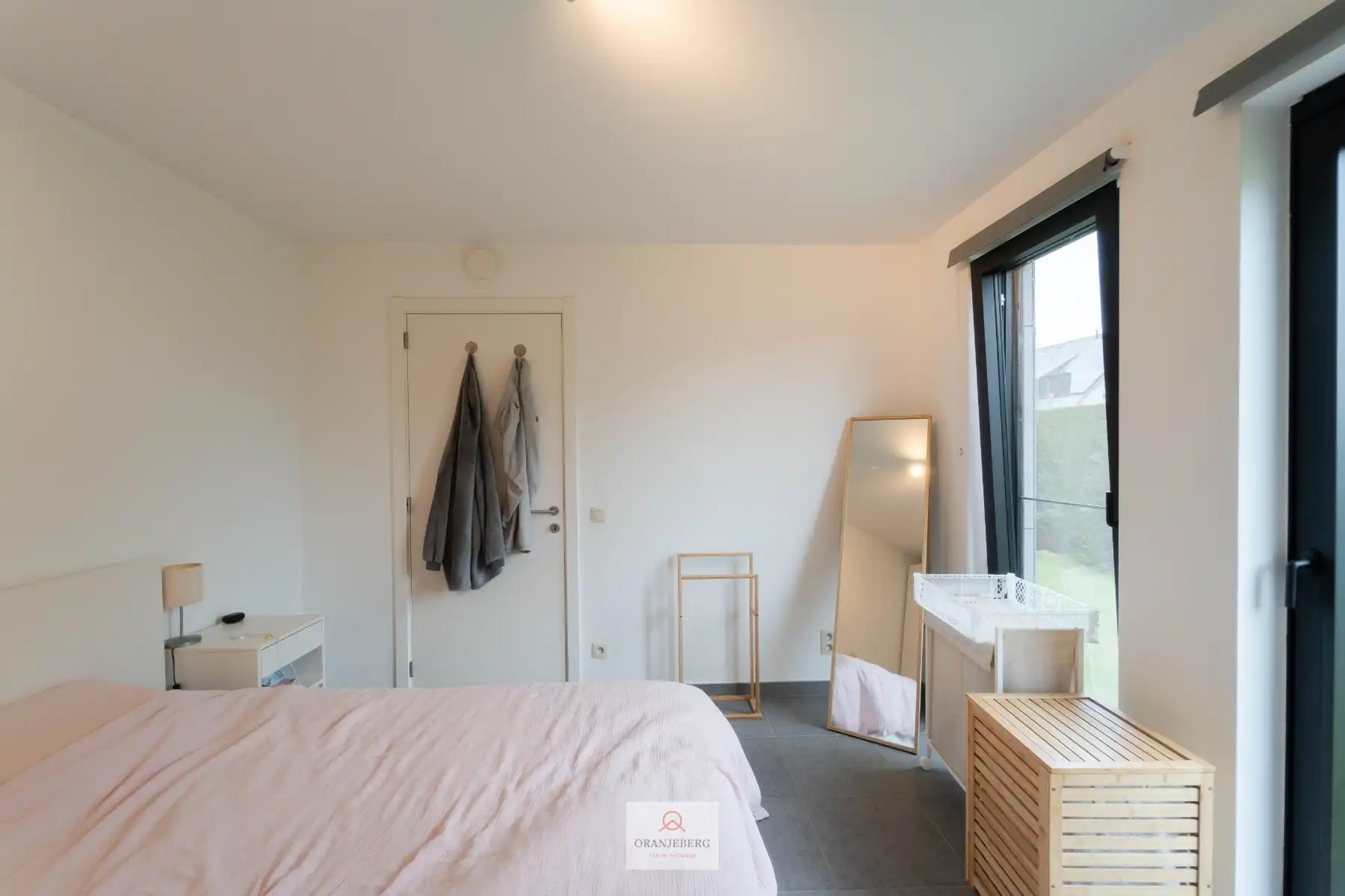 Gelijkvloers 2 slaapkamerappartement met ruime tuin foto 17