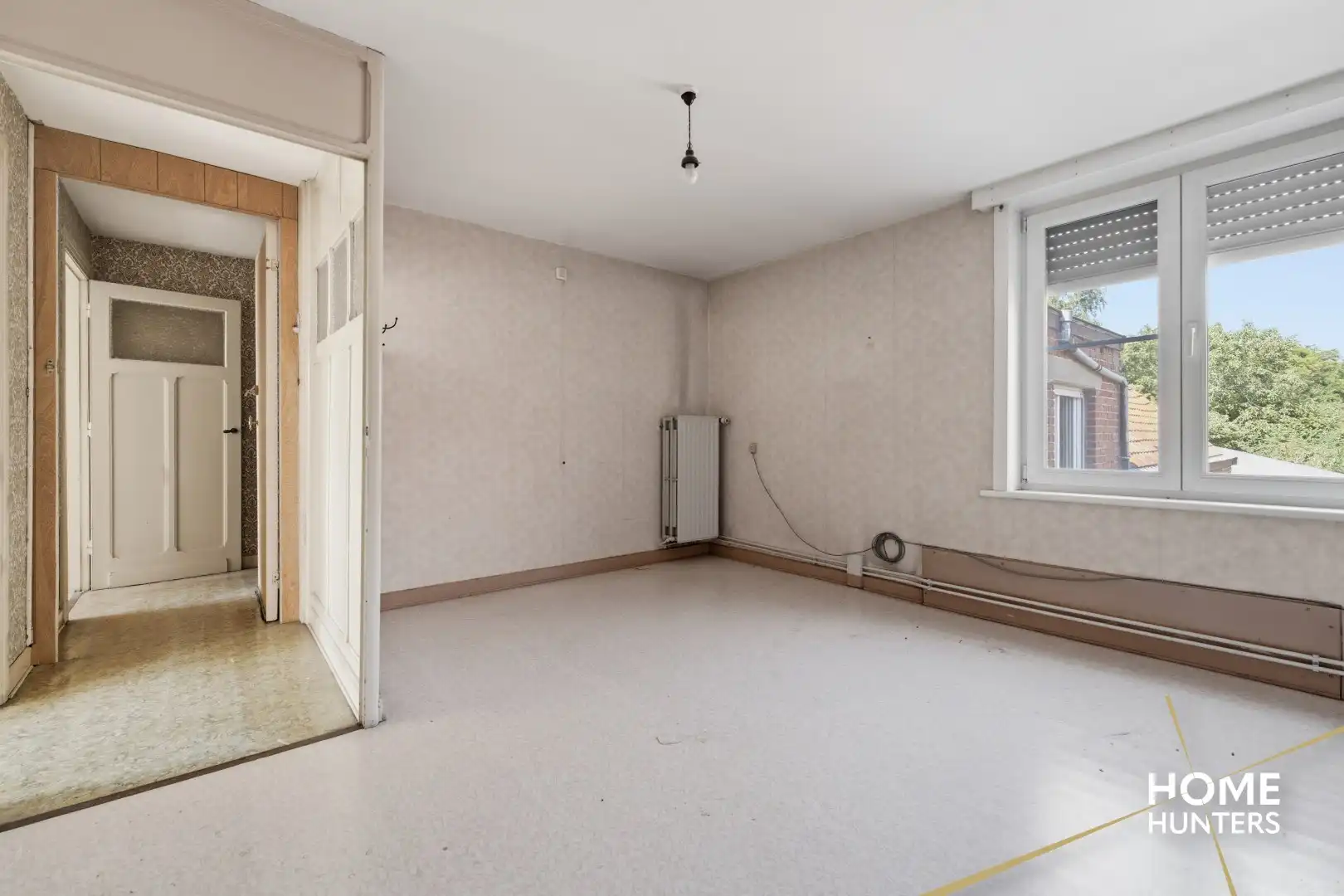 Veelzijdige eigendom met te renoveren woning en twee ruime loodsen in Langemark foto 13