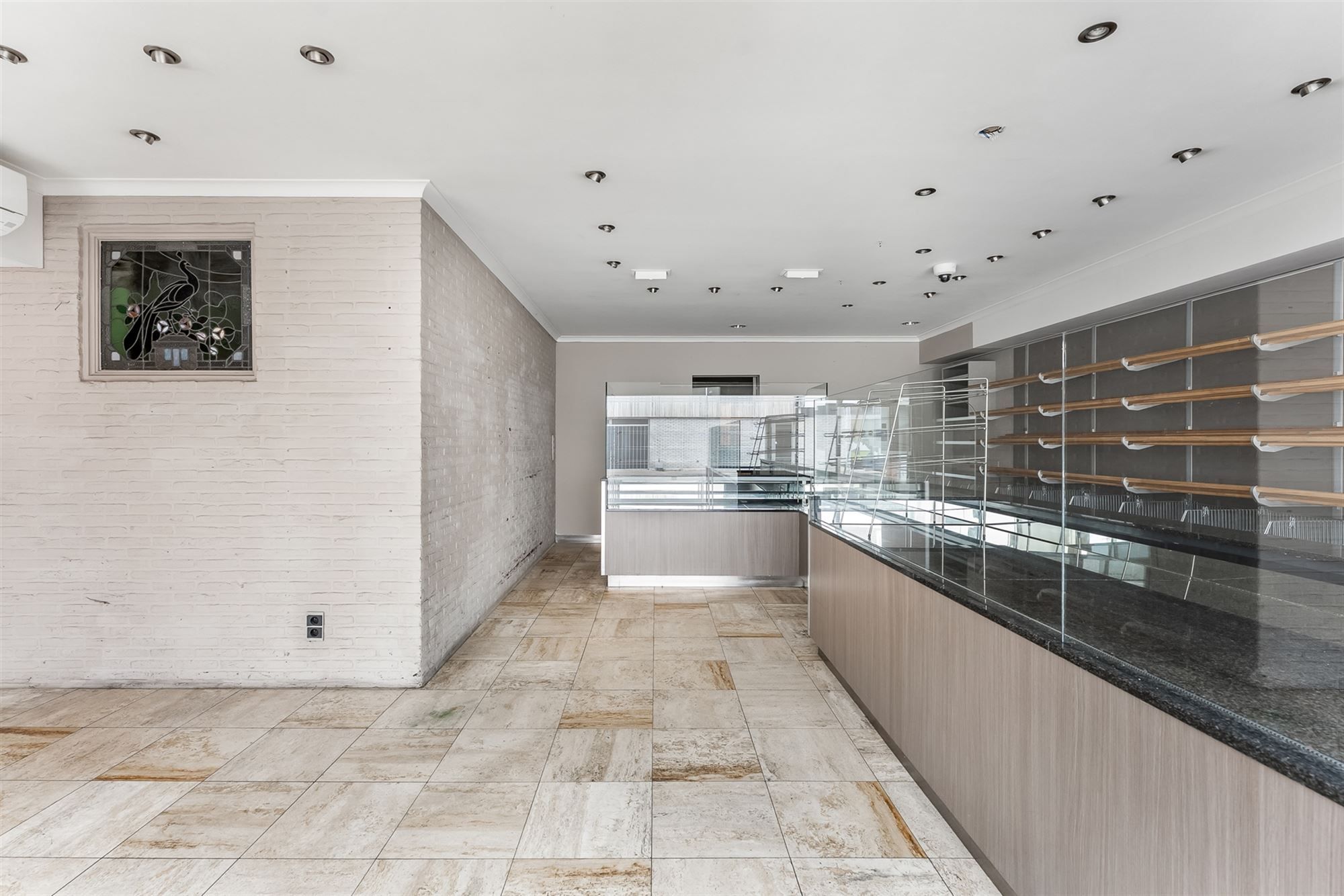 CENTRAAL GELEGEN, RUIM HANDELSPAND MET WOONST (415M²) TE BALEN foto 3