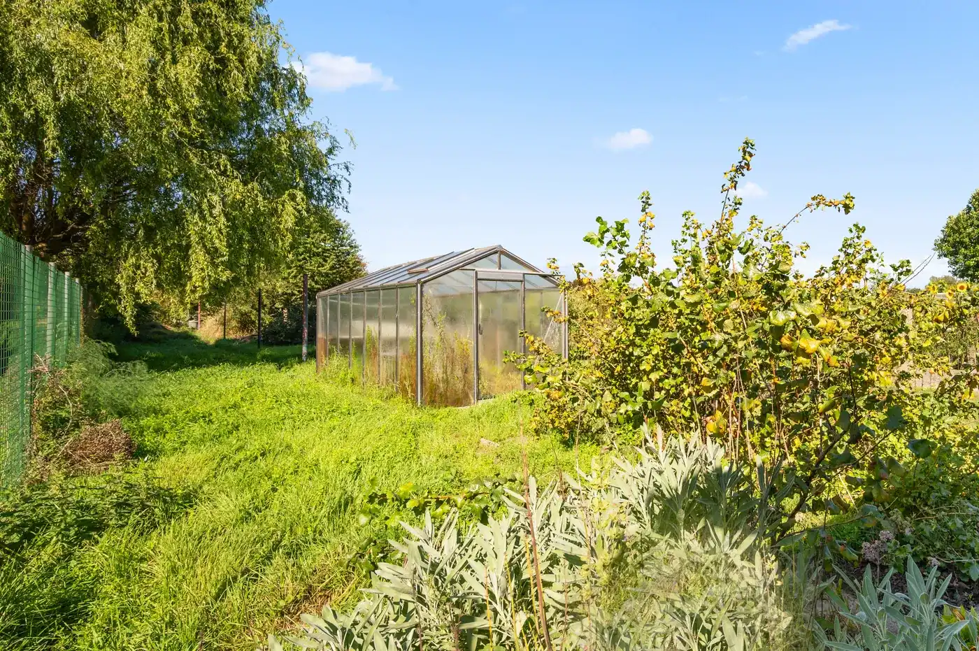 Charmante rijwoning met 2 slpk, tuin en parking foto 24