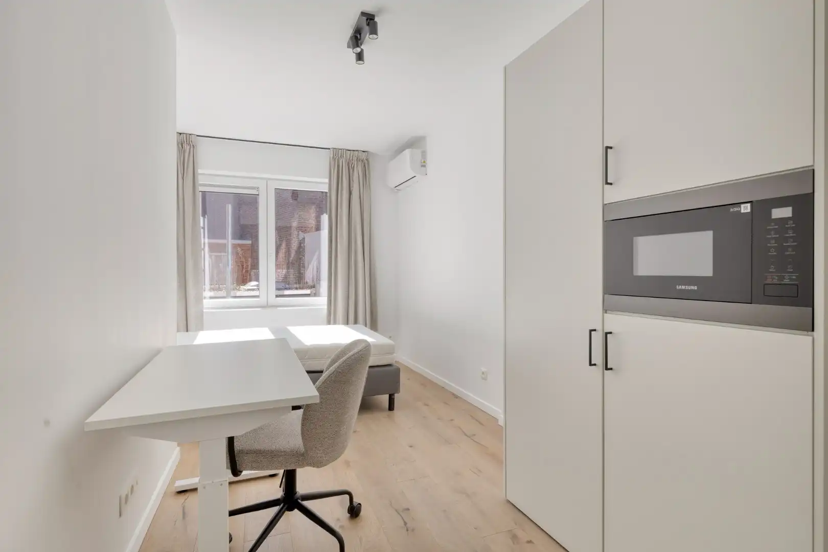 Volledig gerenoveerde studentenkamer in residentie met 15 studentenkamers en een 1slaapkamer appartement in hartje Leuven - EPC label A! foto 7