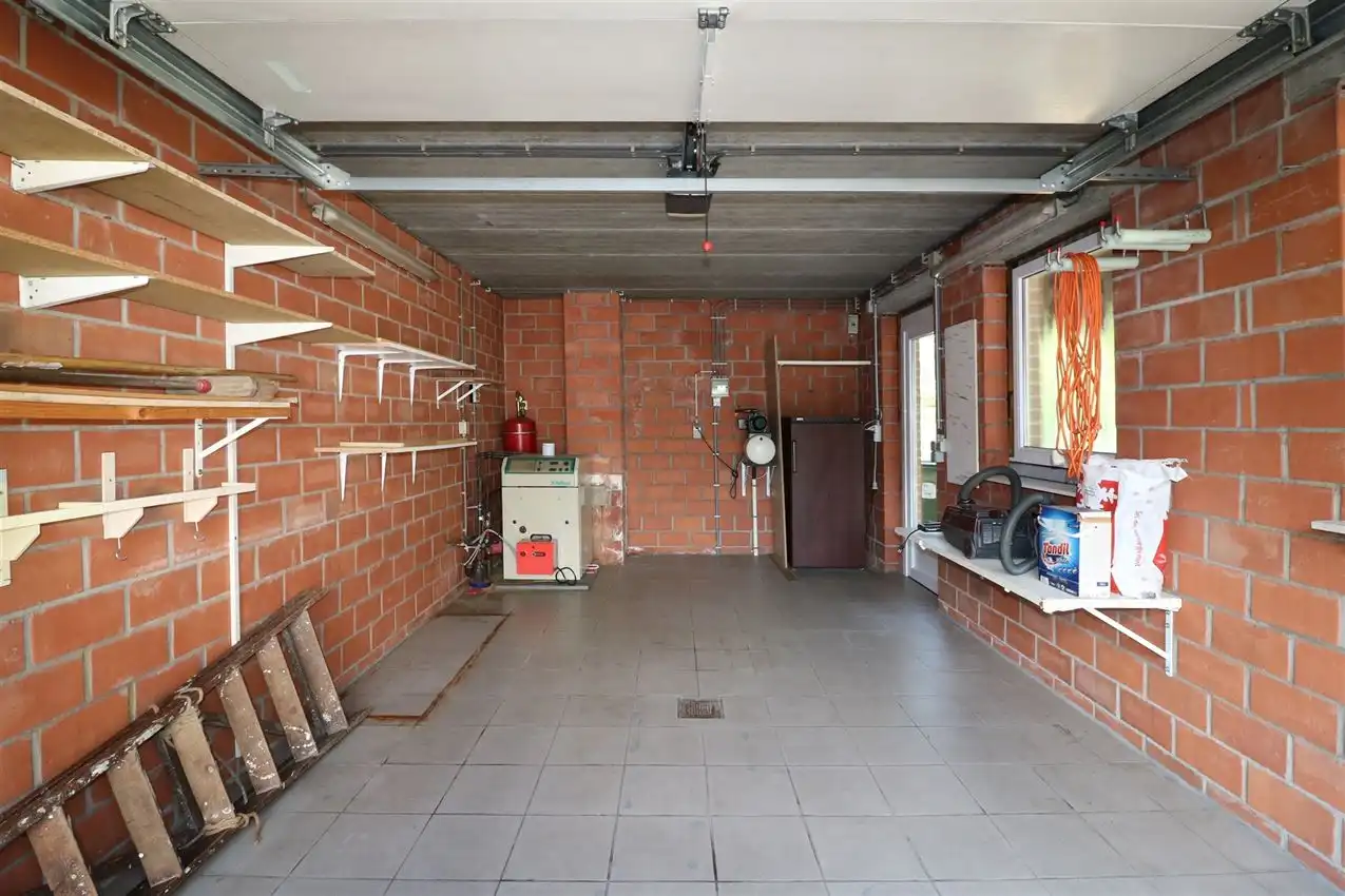 Gusting gelegen woning met 3 slp, garage en tuin foto 31