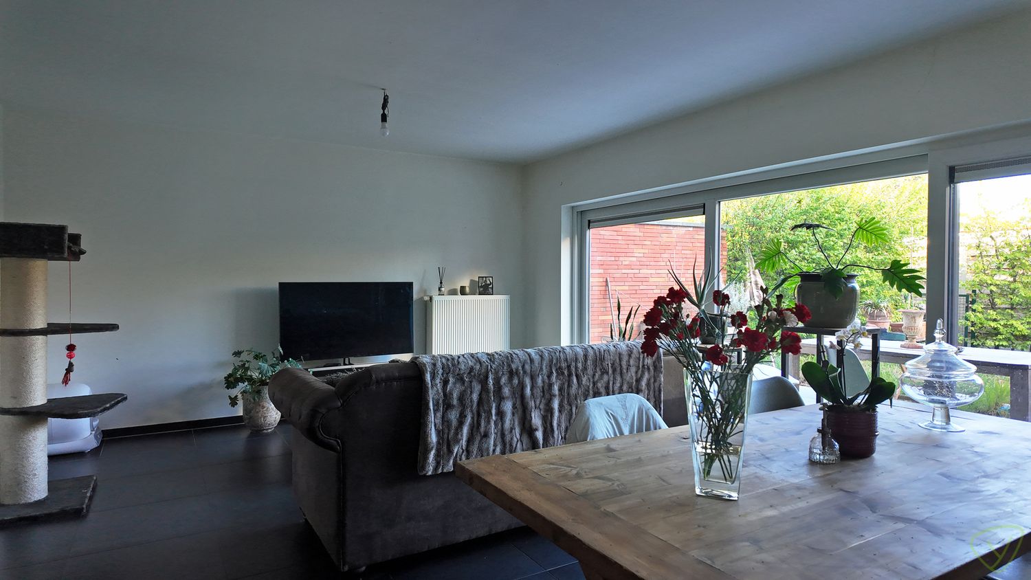 Recente gezinswoning met zonnige tuin, garage en centrale ligging! foto 2