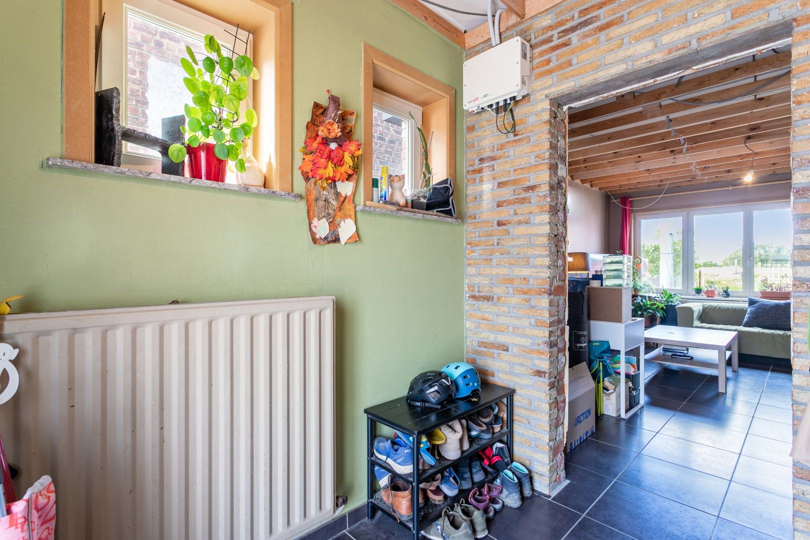 Op te frissen woning met 3 slpks en tuin te Roosdaal foto 3