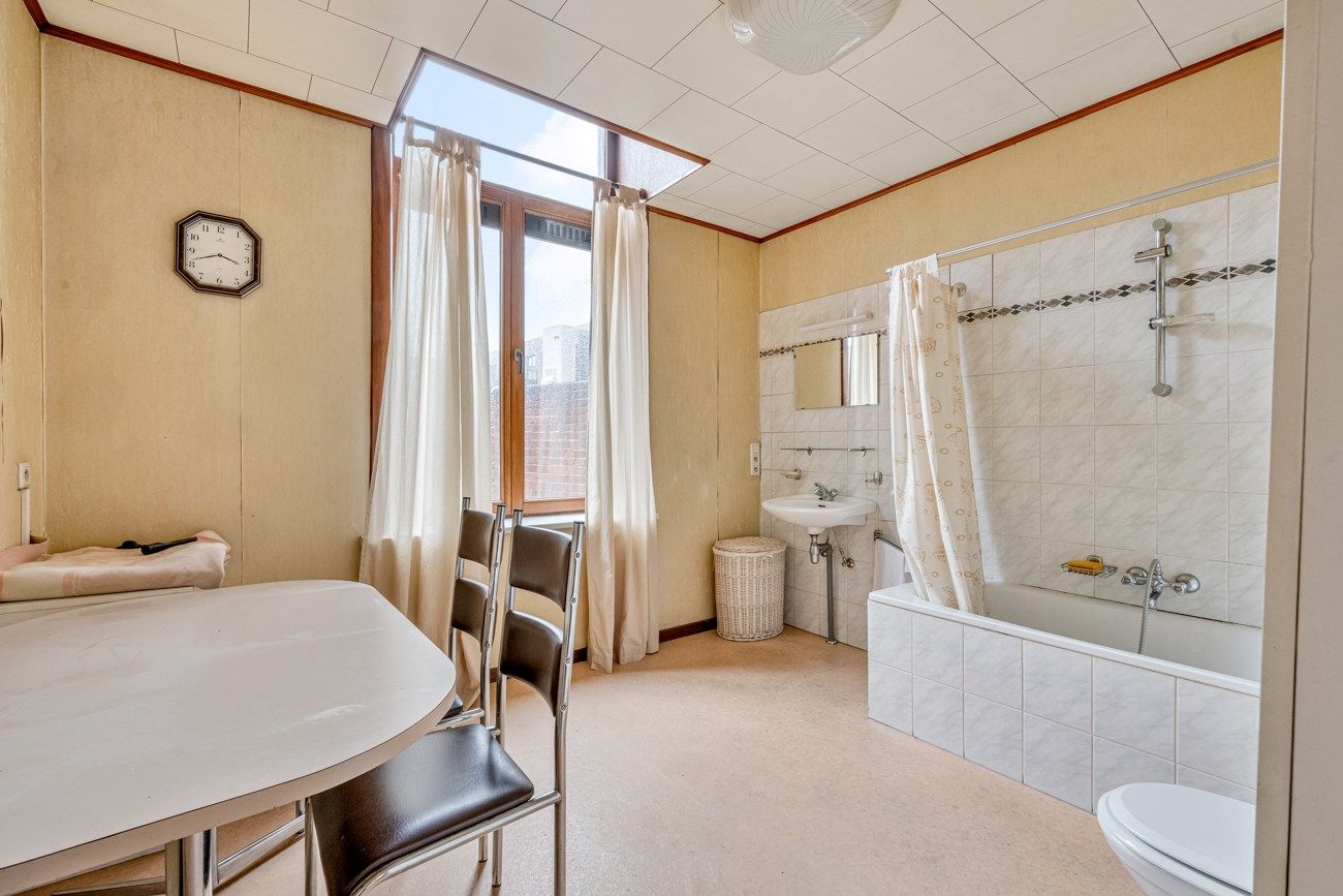 TOPPER - Handelszaak met woonst foto 9