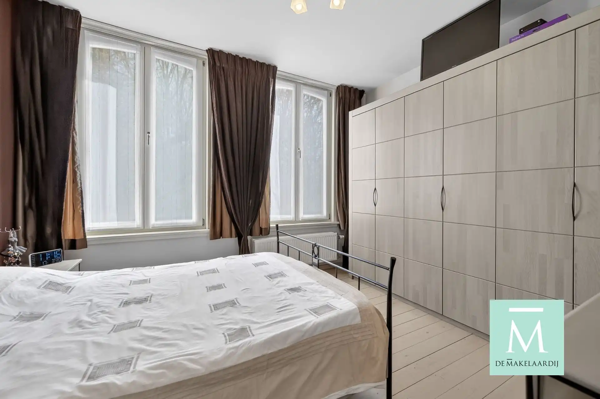 Instapklare woning met 3 slaapkamers en gezellig stadstuintje op toplocatie! foto 11