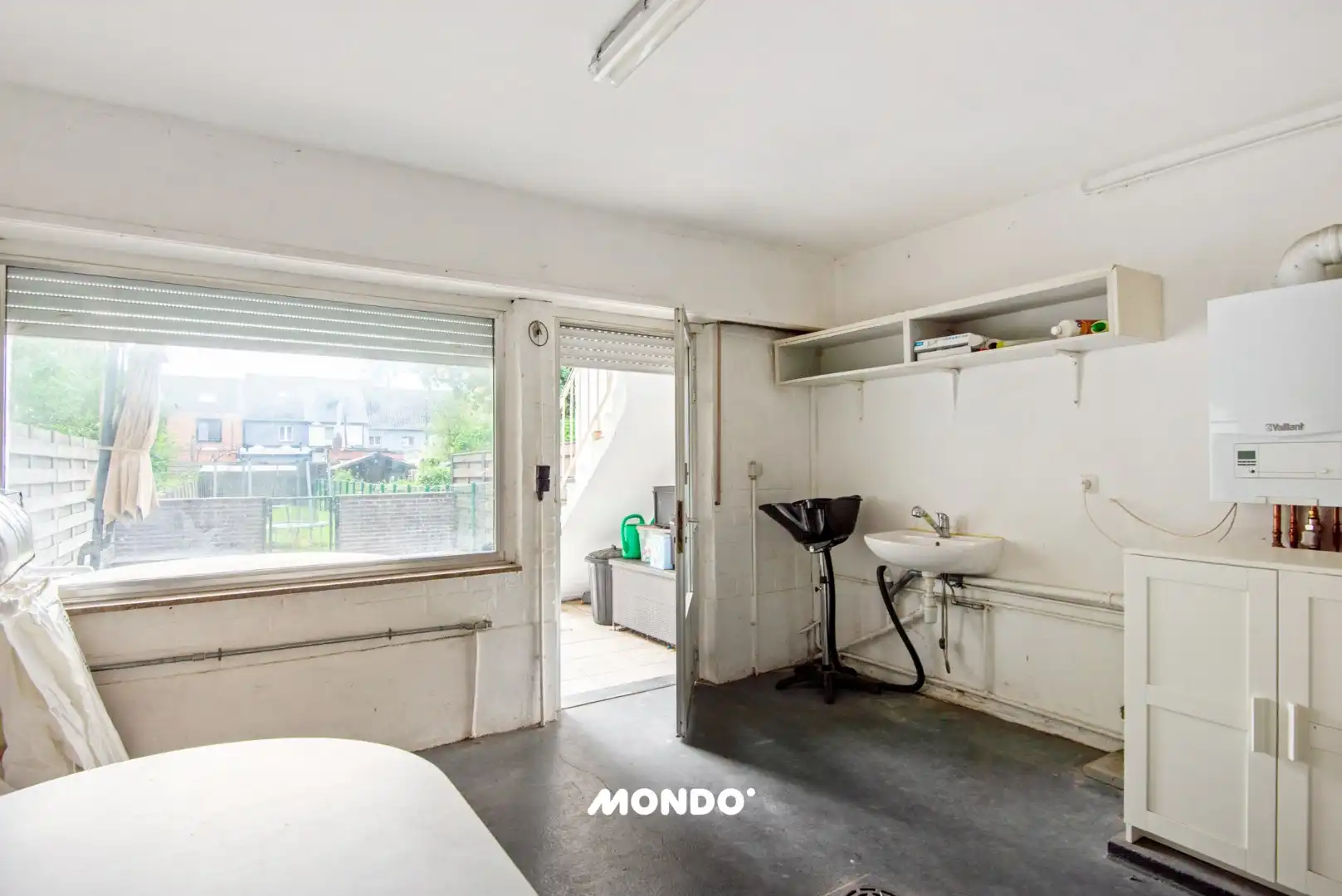 Ruime woning met 2 slaapkamers, garage, twee terrassen en tuin  foto 11