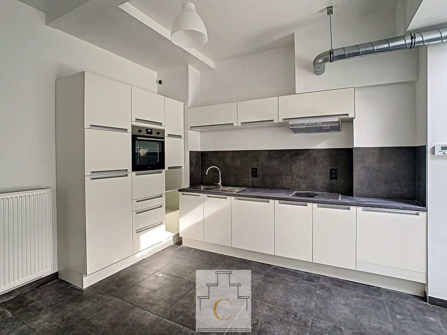 gerenoveerde rijwoning met zuidgerichte tuin voorraan St Andries foto 4