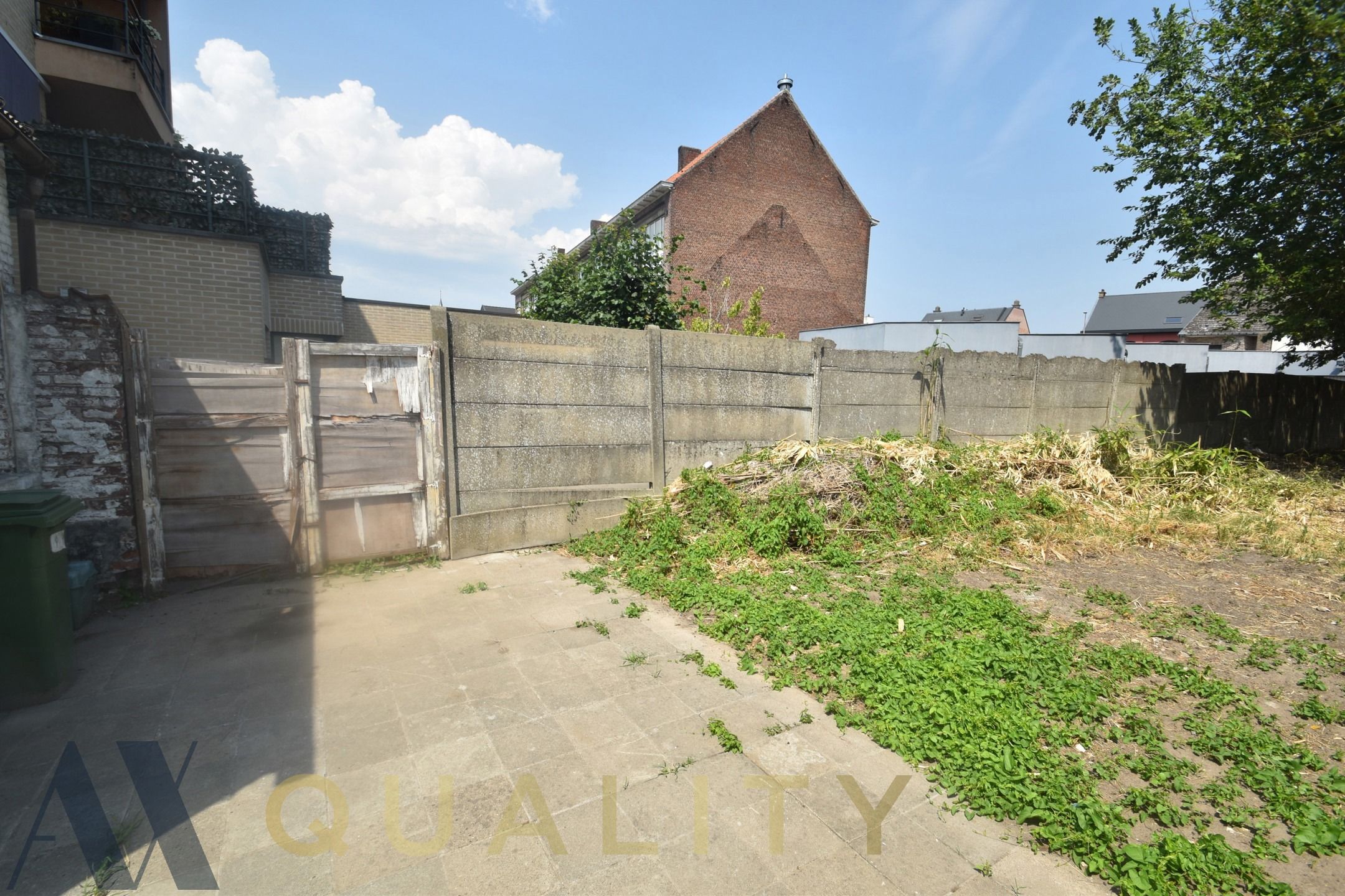 Nabij het centrum van Lebbeke gelegen te renov. rijwoning of bouwgrond op een terrein van 2 are 80 ca.  foto 8