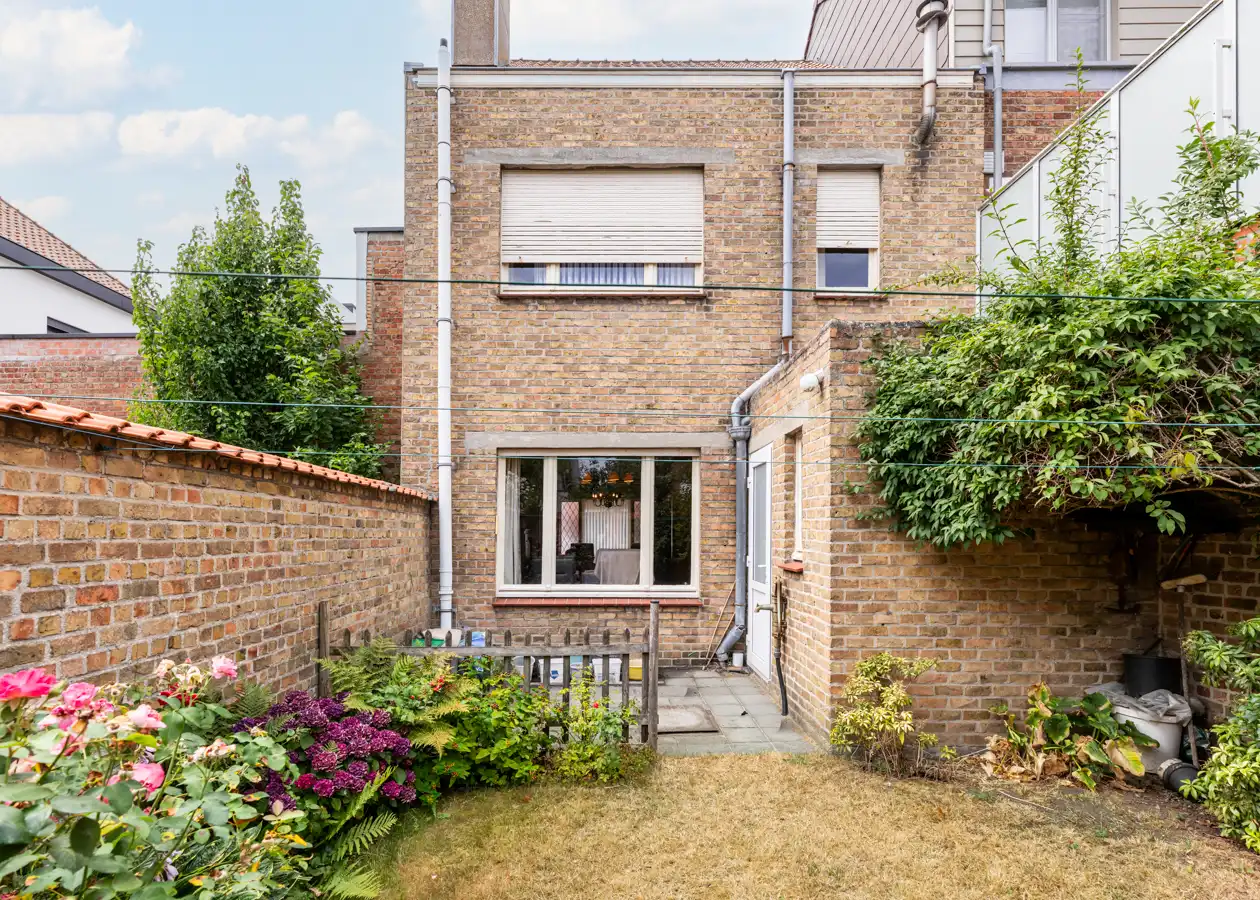 Te renoveren woning met zonnige stadstuin en veel potentieel foto 24