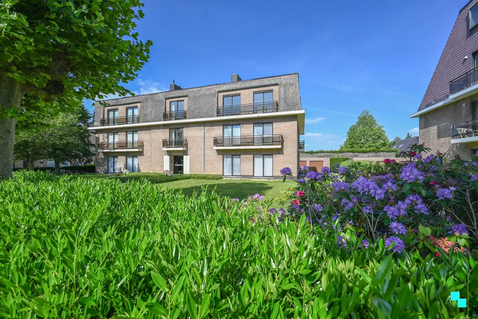 Hoofdfoto van de publicatie: Tweeslaapkamerappartement met garage op een rustige locatie in Beveren-Leie