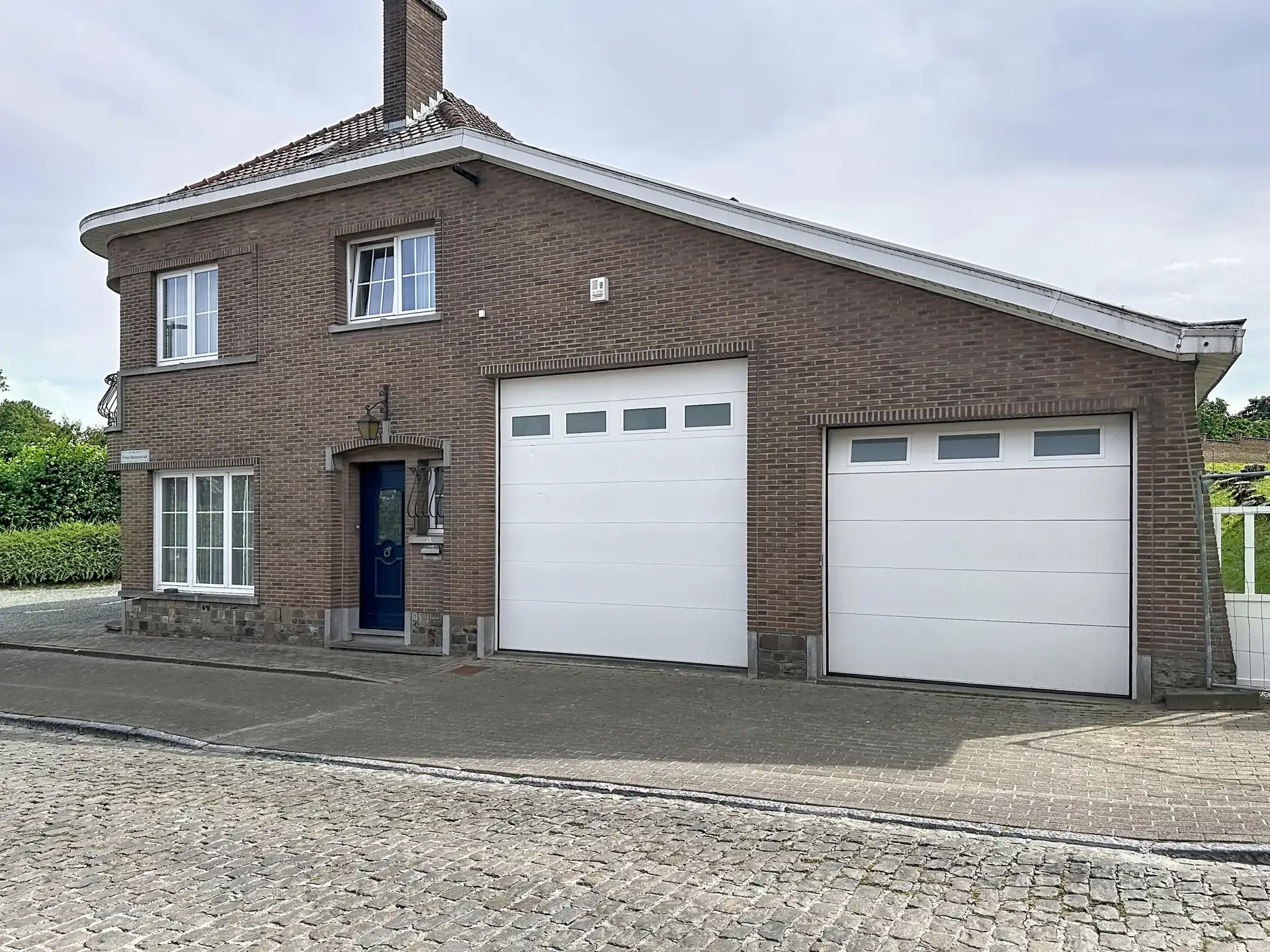 Stevige viergevel met Z-gerichte tuin en werkplaats foto 4