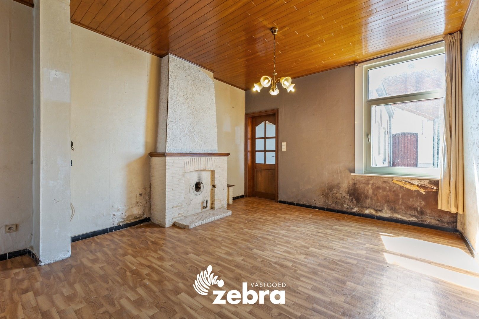 Te renoveren woning met stadskoer in centrum Tielt! foto 5