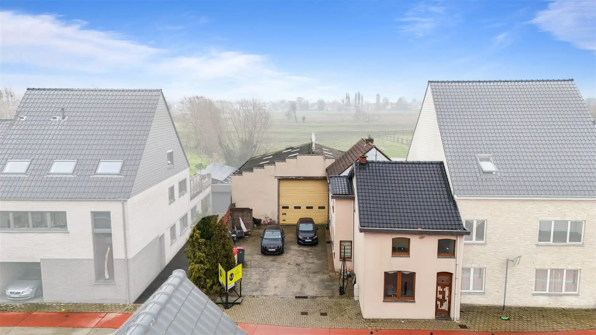 Halfopen bebouwing met magazijn (225m²) foto 4