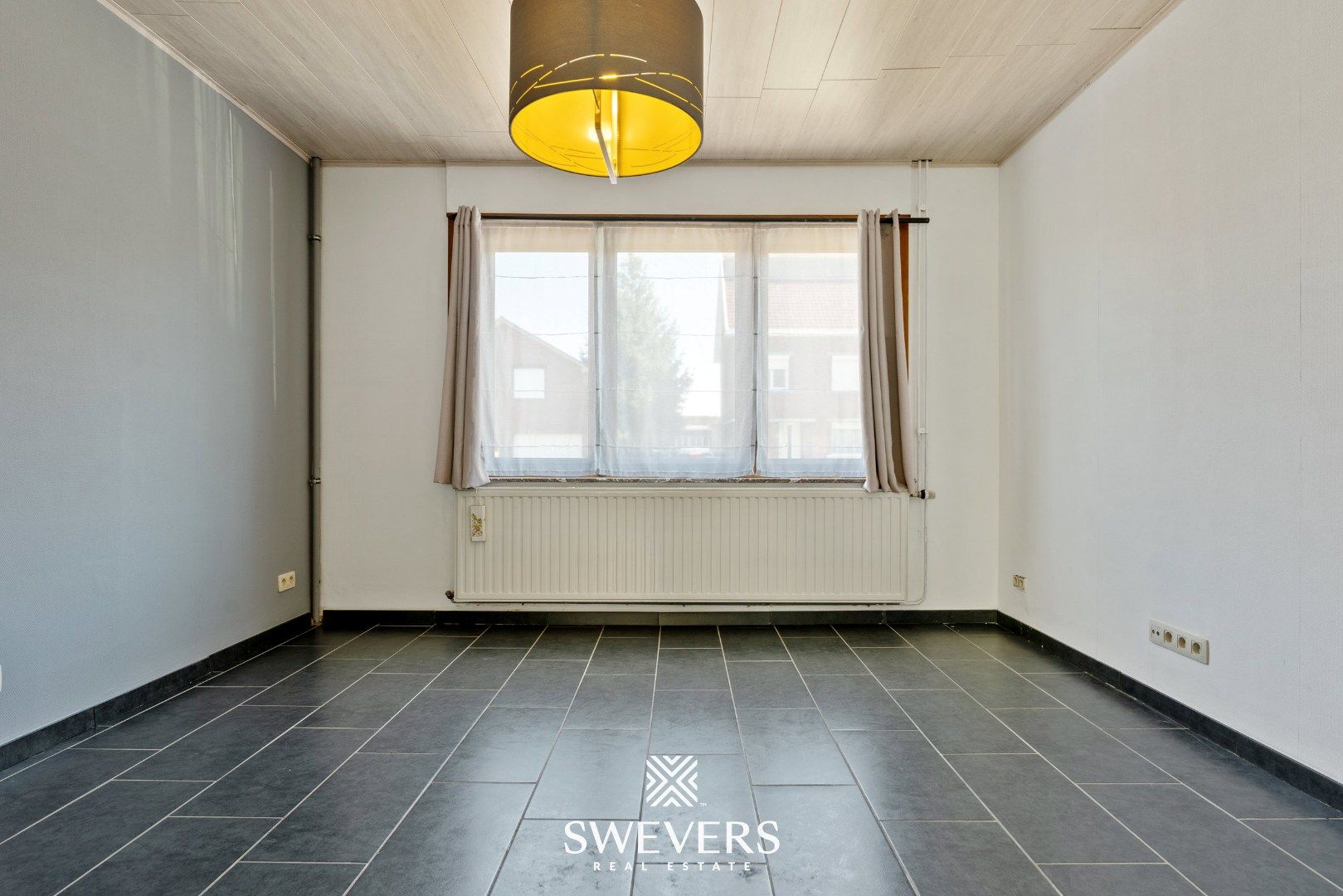 Instapklare woning met 4 slpks en tuin in Borgloon foto 7