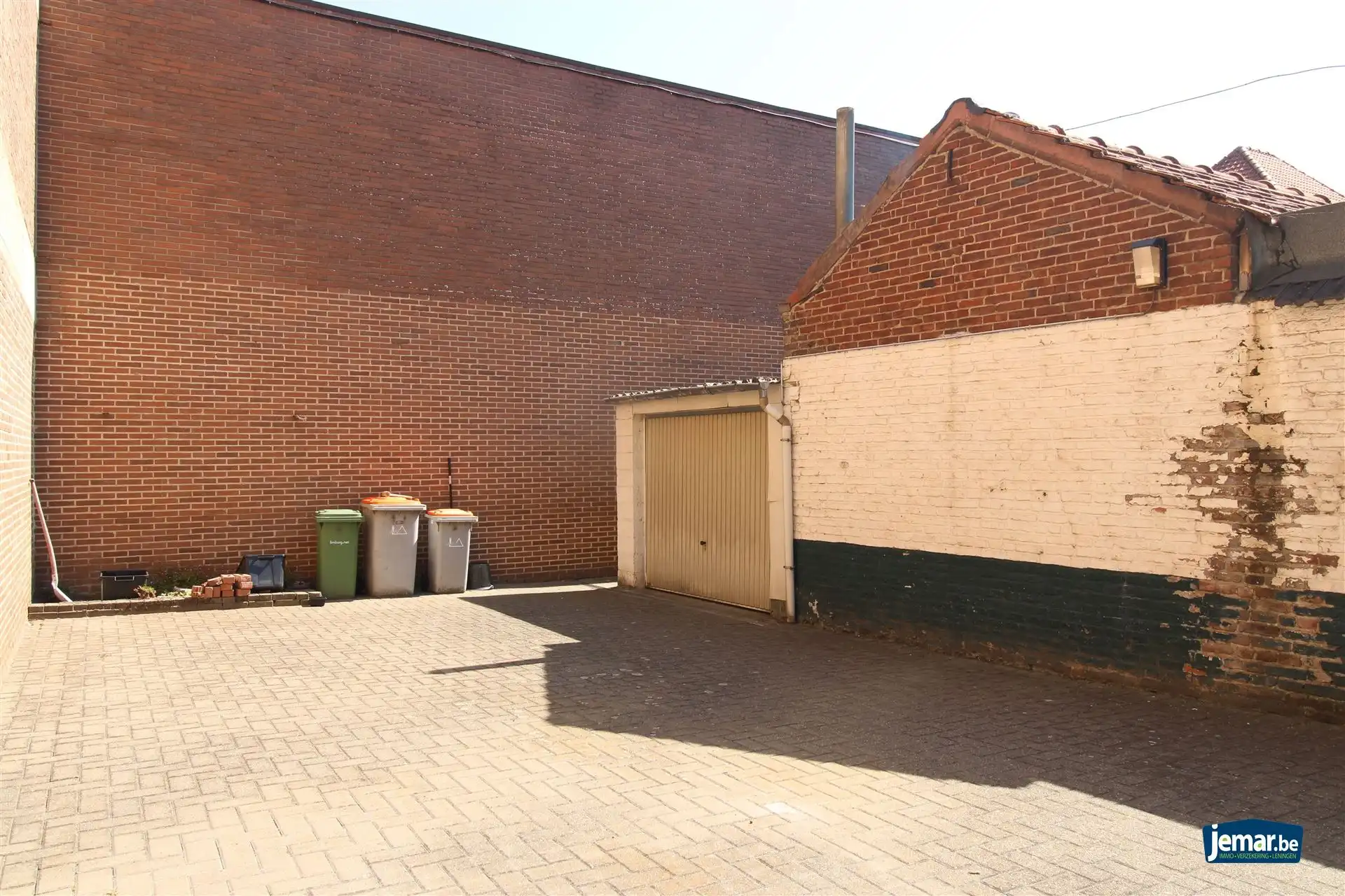 Karaktervol handelspand met woonst op toplocatie – ideaal om wonen en werken te combineren in het hart van Maasmechelen! foto 16