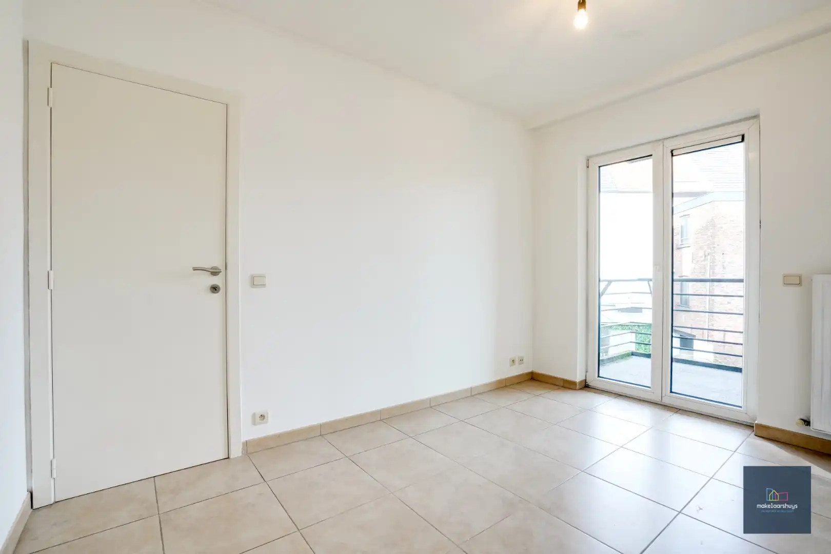 Goedgelegen 2slpk-appartement met terras en staanplaats foto 11