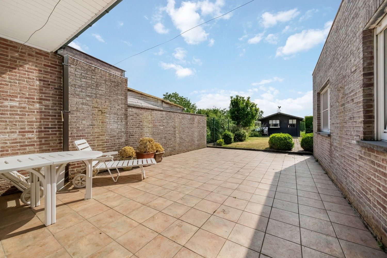 Rijwoning met potentieel, zonnige tuin, garage en uitbreidingsmogelijkheden te koop in Ruddervoorde foto 19