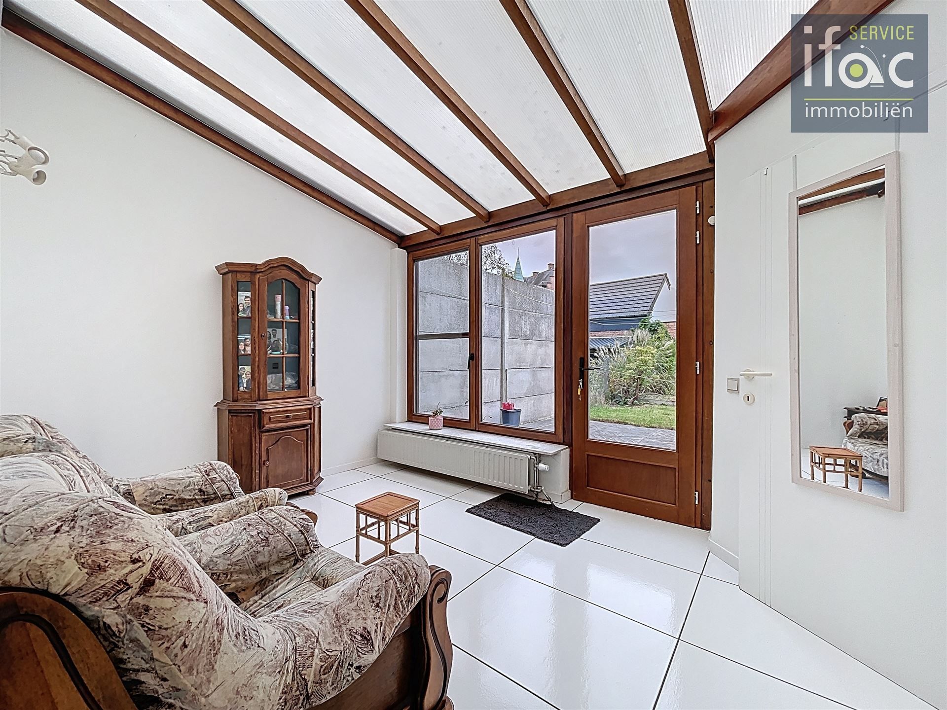 Rijwoning met tuin  foto 8