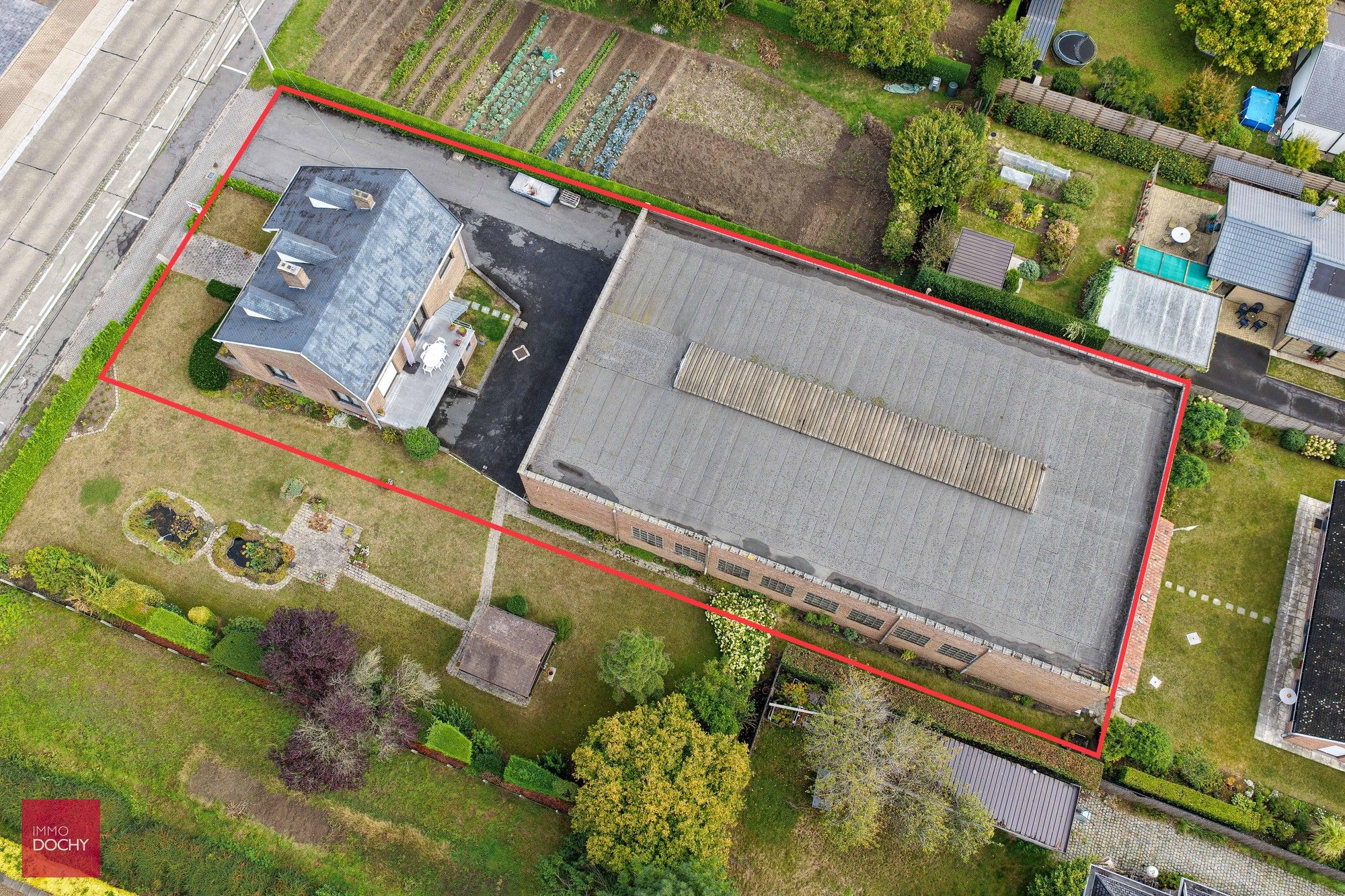 Hoofdfoto van de publicatie: Alleenstaande woning met ruim magazijn (575m²)