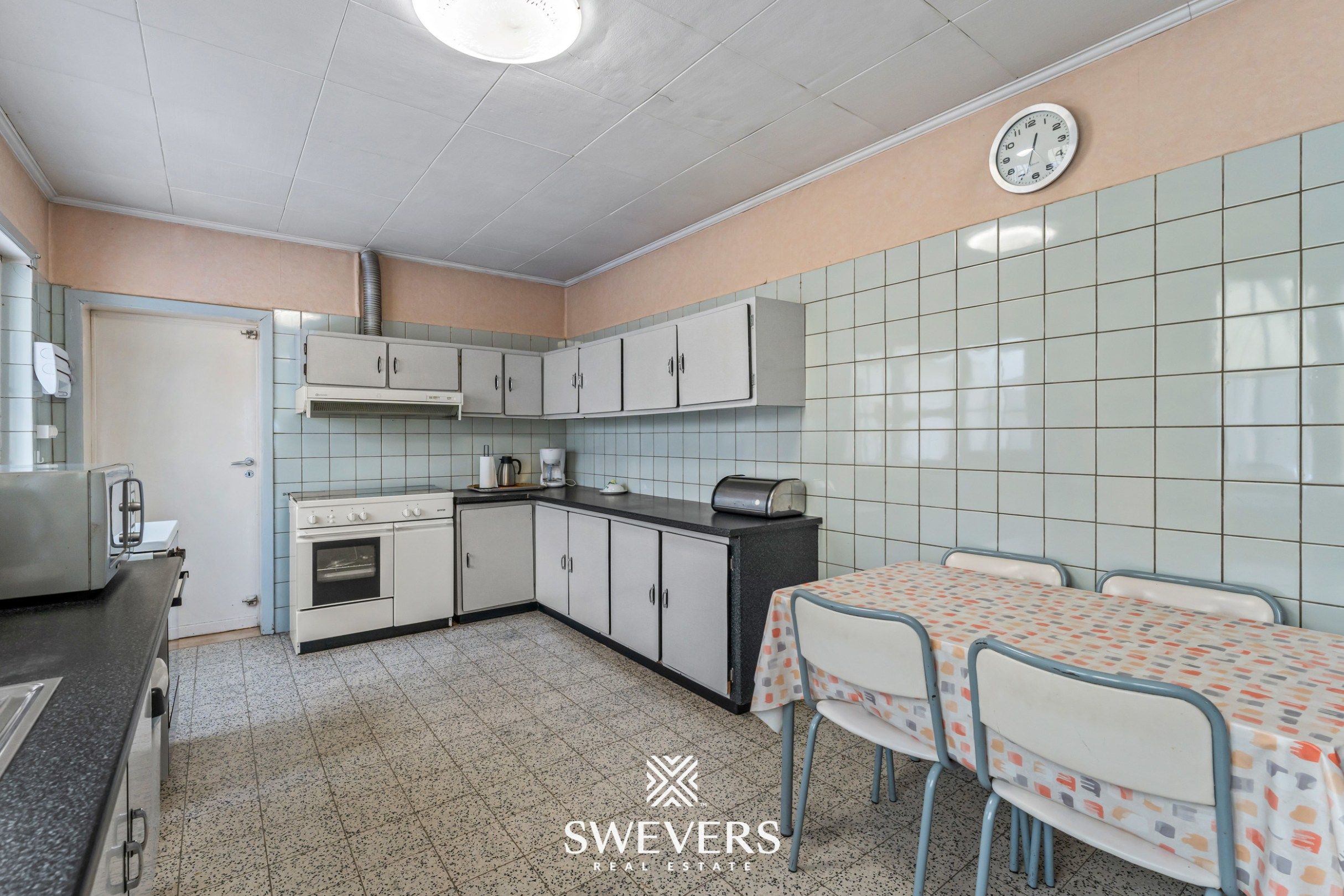 Charmante halfopen gezinswoning met potentieel (8are) op toplocatie in Diepenbeek foto 12