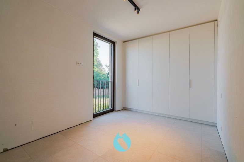 Green Square presenteert u 35 nieuwbouwappartementen en een winkelpand, letterlijk ónder de Kerktoren van Sleidinge. foto 4