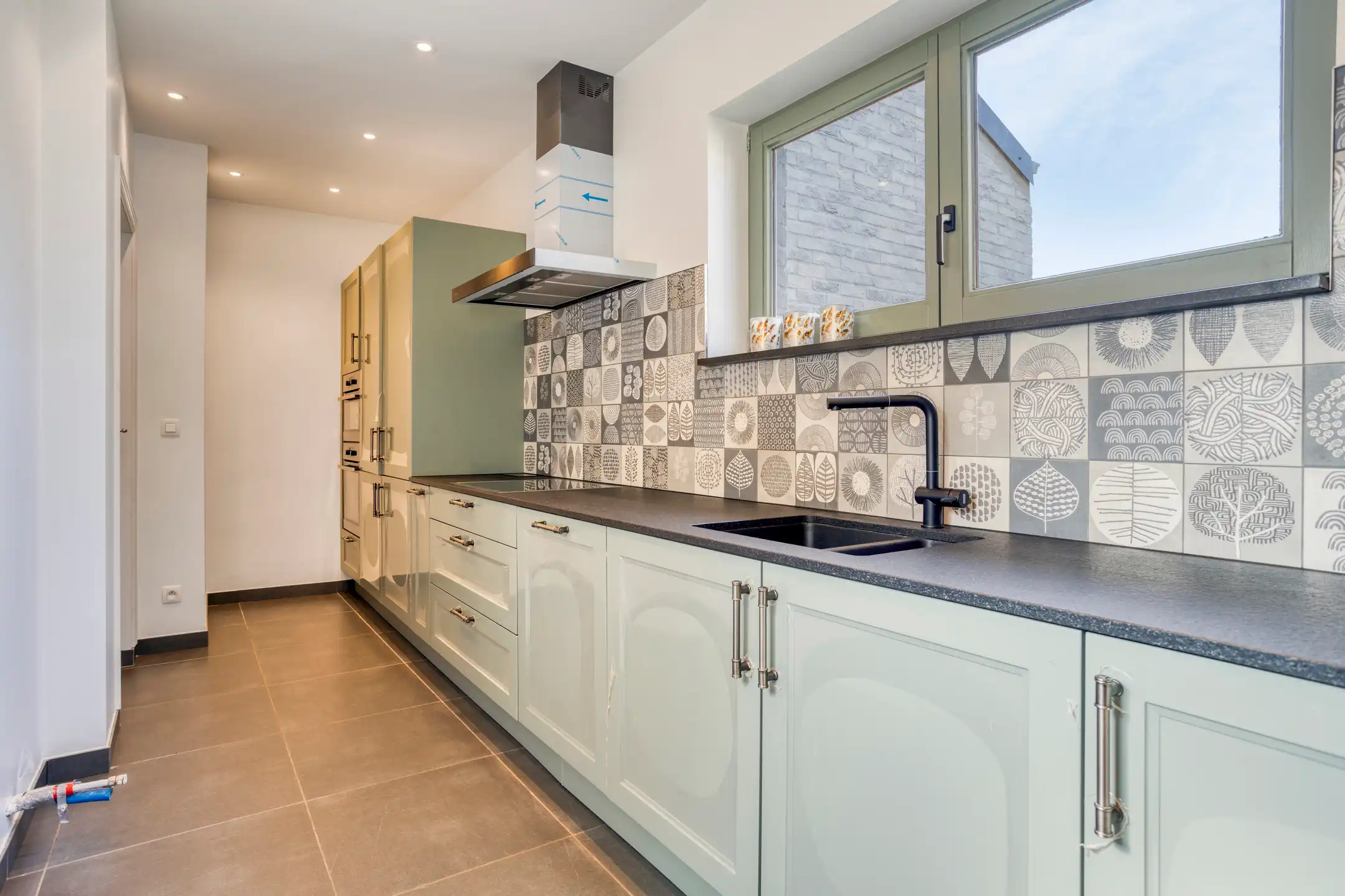 Gerenoveerde gelijkvloerse woning te Assebroek foto 12