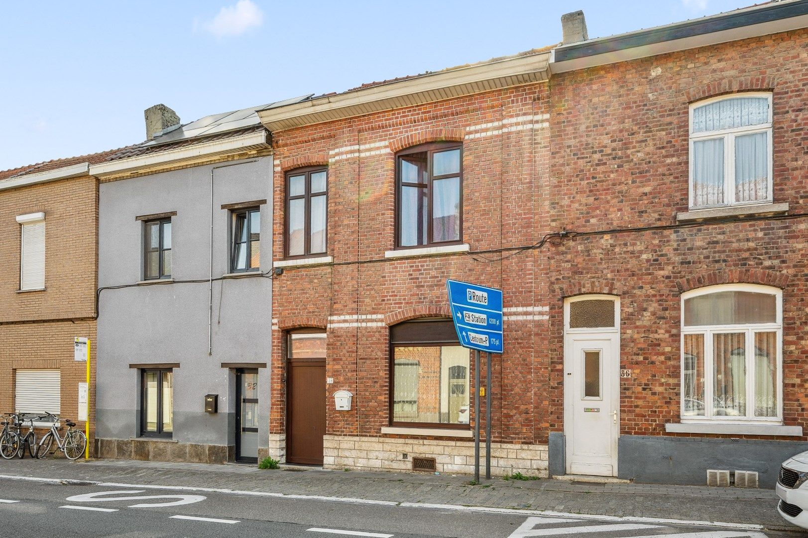 Te renoveren rijwoning met potentieel in de buitenrand van Tienen foto 3