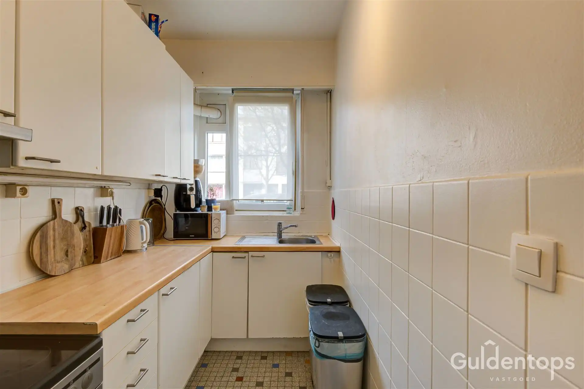 zeer goed gelegen ruim 2 slaapkamerappartement mét tuin foto 7