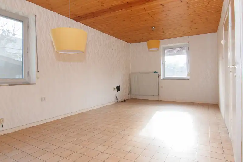 Te renoveren (uitbreidbare) woning (6% btw) of sloop/heropbouw op een rustig gelegen perceel van +- 11are op wandelafstand van het centrum van Diepenbeek! foto 12