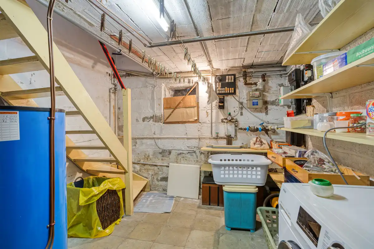 Te verfraaien woning - ruime tuin en garage foto 28