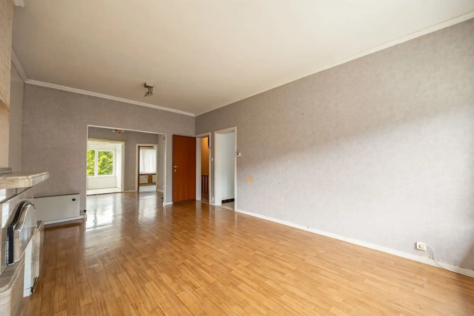 Ruime gezinswoning met zonnige tuin en renovatiepotentieel foto 7