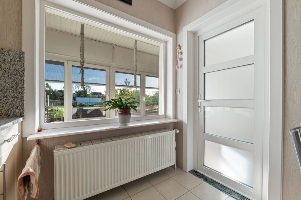 CHARMANTE, INSTAPKLARE WONING MET 3 SLAAPKAMERS, GROTE ZOLDER EN GEEZELLIGE BUITENRUIMTE foto 16