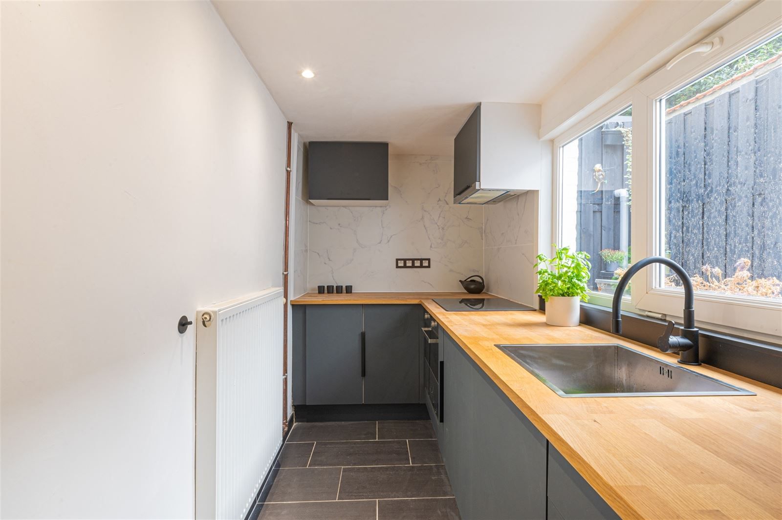 Instapklare rijwoning met stadskoer foto 5