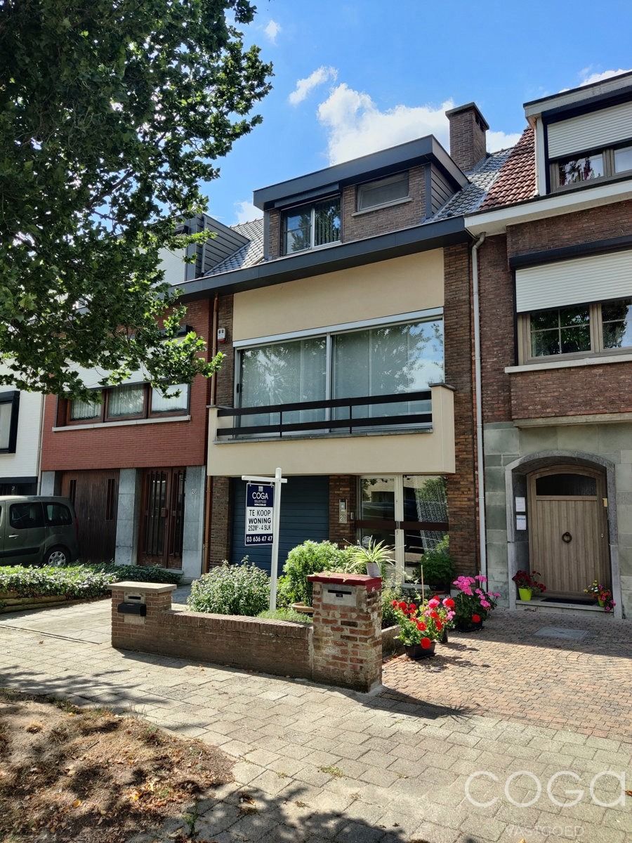 Woning met 4 slaapkamers, garage en tuin foto 32